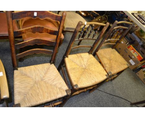A 19th century rush seated ladder back chair;  others (3)