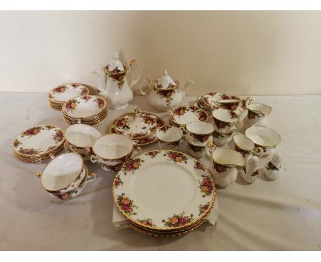 Royal Albert Old County Rose Bone China service to include; a coffee pot, tea pot, cup and saucer trios, bowls, cake stand, d