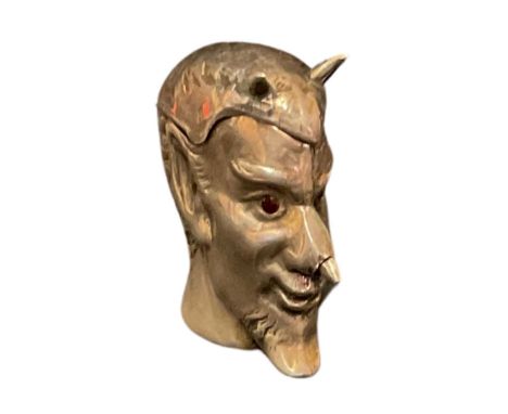 A white metal novelty vesta case modelled as the Devil, spring loaded cover, push button to nose, 4.5cm long
