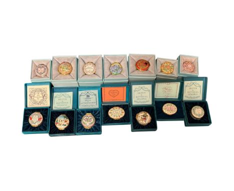 A collection of fourteen Halycon Days enamel boxes, twelve relating to Valentine's Day, and two relating to Christmas, all bo