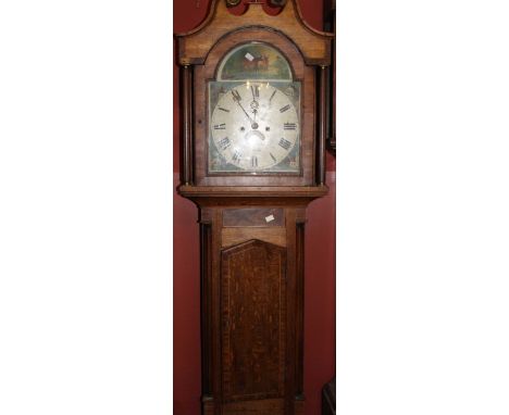 A George III oak and mahogany inlaid longcase clock with a glass fronted and brass capped columned hood. The clock is an 8-da