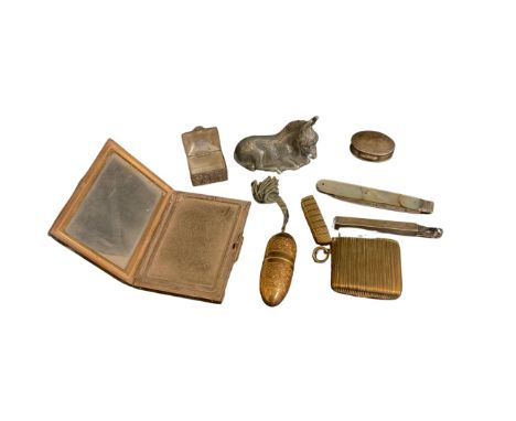 Queen Alexandra's Imperial Military Nursing Service compact, a brass vesta case, a mother of pearl fruit knife with silver bl