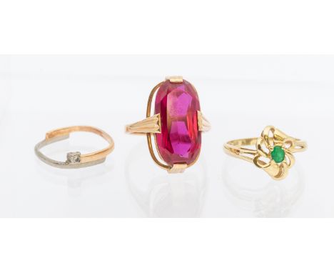 Three Gold Rings.  To include a Russian "583" stamped Oval Brilliant Cut Pink Paste Stone Ring. The Ring contains an Oval Bri
