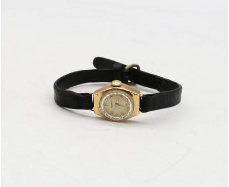 Ladies Vintage 9ct Gold Rotary Watch with Black Leather Strap
The circular watch face width measures approx. 18mm including t