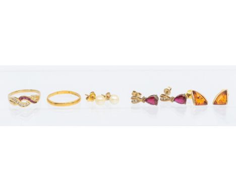 A selection of Gold Jewellery. The Gold Jewellery includes a 22ct Gold Wedding Band, a tested 14ct Gold Ruby and Cubic Zircon
