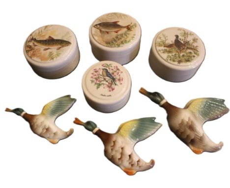 Ceramic pots with lids featuring fish and birds and set of Keele Pottery flying ducks (some damage to ducks)&nbsp;