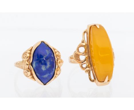Two Russian Gold Rings.  To include a Russian "583" stamped Orange Resin Stone Ring. Total Gross Weight is approx. 5.3 grams.
