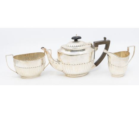 Sterling Silver Three-piece Tea Service.  To include a Teapot, Sugar Bowl and Creamer Jug. The Teapot is hallmarked with the 