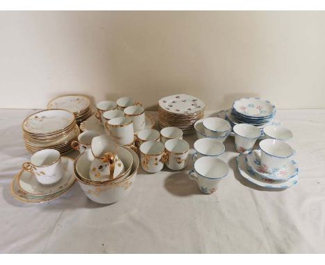 A Victorian white and gilt china tea set together with a Melba bone china tea set 5219 pattern. (2)&nbsp;