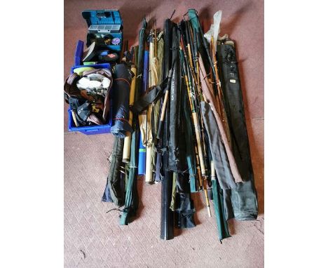 A Large quantity of fishing equipment to include rods, reels and various tackle by brands such as Shimano etc.