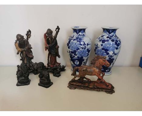 Two early 20th century Fuzhou (Foochow) lacquered figures depicting Shoulou holding a scroll and staff. One has a break to th