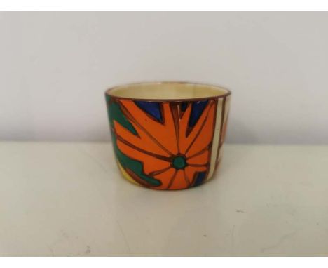 Small Clarice Cliff Mustard Pot Umbrellas And Rain Pattern Circa 1930, 4cm high (small 1cm hairline crack). (1) P
