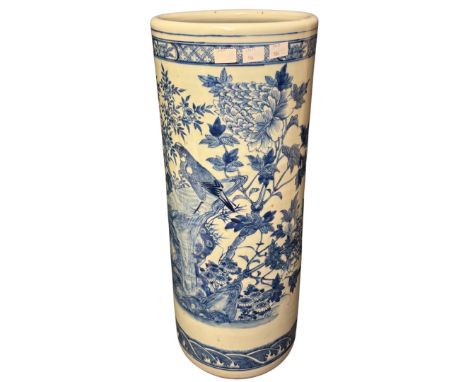 A Chinese blue and white stick stand painted with birds in a rocky garden landscape, 20th century, 58cm high condition: some 