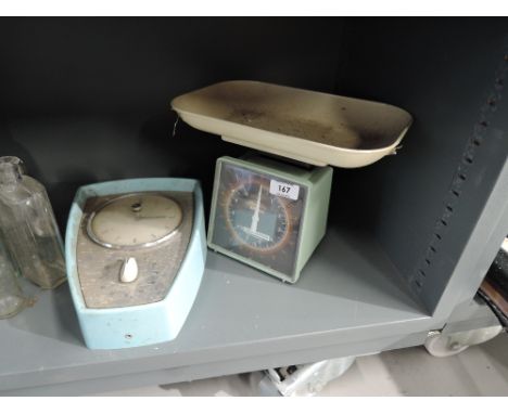 A set of vintage kitchen scales and a clock/timer