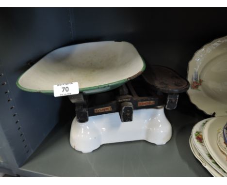 A set of vintage kitchen scales with white and green enamel by Avery