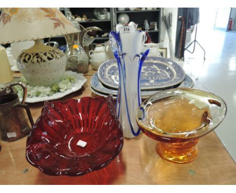 A selection of vintage glass wares including amber and ruby