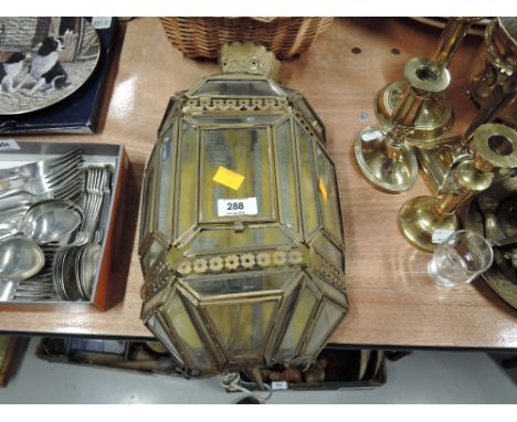 A vintage wall mounted brass light