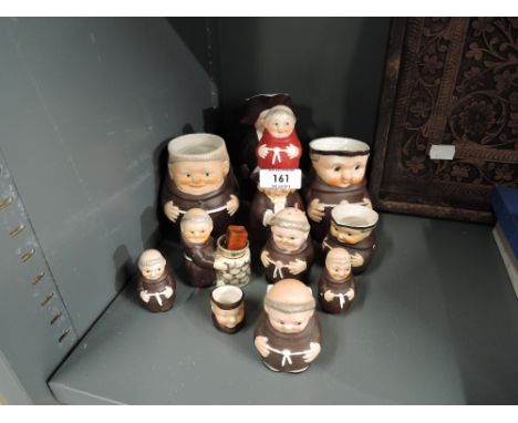 A selection of Hummel and similar jugs, cruets and novelty items, various Monks