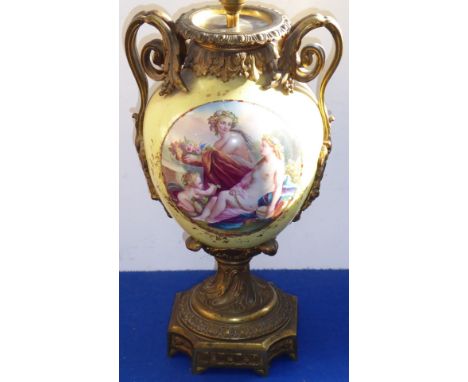 A 19th century French ormolu-mounted, ovoid two-handled porcelain urn (now as a lamp); egg- and-dart style moulding to the to