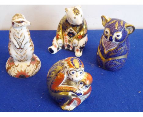 Four Royal Crown Derby paperweights: a meerkat, a seated bear, a koala bear and a monkey group (4)  CONDITION REPORT: The mee