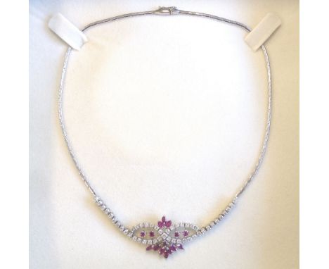 An 18-carat white gold, ruby and diamond necklace 