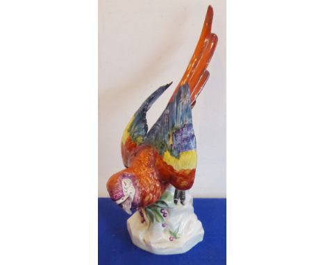 A late-19th / early-20th century German porcelain model of a parrot by the Unter Weiss Bach Factory, impressed and printed ma
