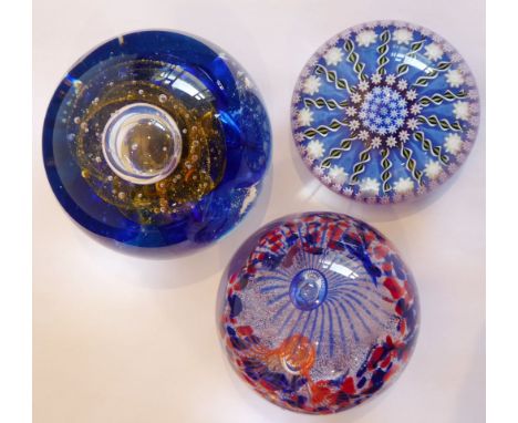 Three paperweights; the larger entitled 'Amulet' from Selkirk Glass and dated 2004, one further Caithness weight entitled 'Lu