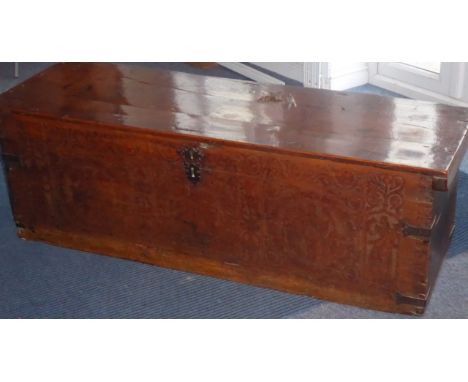 A fine and rare Italian walnut cassone (probably 17th century); the chest of excellent colour and patination and the lid with