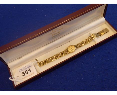 A lady's 9-carat yellow-gold-cased dress watch; the oval gold-coloured dial signed Rotary and with baton markers, Swiss made 