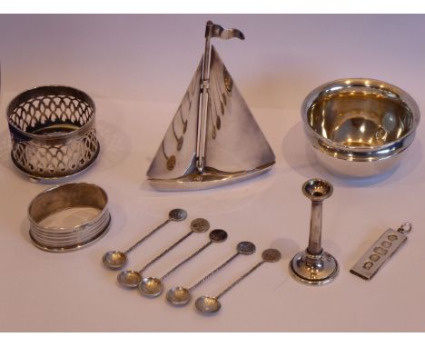 ADDED LOT    A mixed silver and silver plated group to include silver napkin ring, silver mustard holder, a small circular si