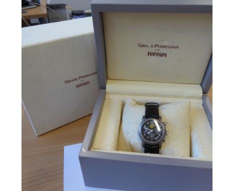 ADDED LOT    Girard-Perregaux for Ferrari, a Limited Edition (34/250) gentleman's titanium cased Chronograph wristwatch, blac