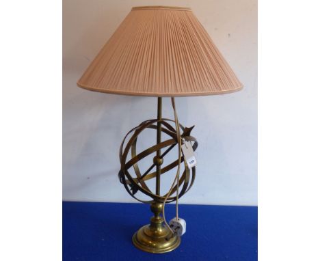 A brass table lamp unusually modelled as an armillary sphere (with shade), lamp height (minus shade) 55cm 