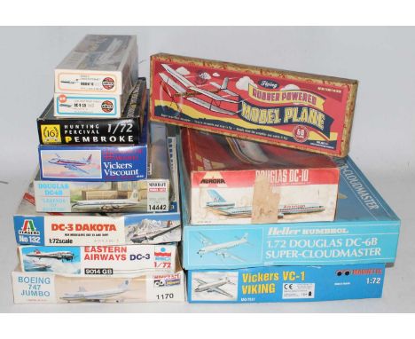 Group lot of various makers of civilian aircraft kits, 11 plastic and 1 Rubber band powered model plane by Trans Pacific ltd,