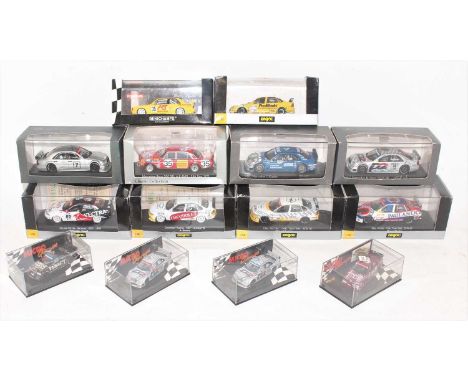 A group of 14 mainly Onyx and Minichamps models, boxed and includes 4 models in 1:64th and 10 models in 1:43rd scale models. 