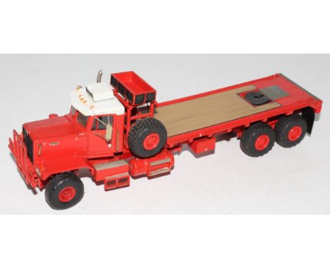 An ASAM? or similar 1/48 scale white metal and resin kit built model of a Kenworth 963 winch lorry, finished in red and white