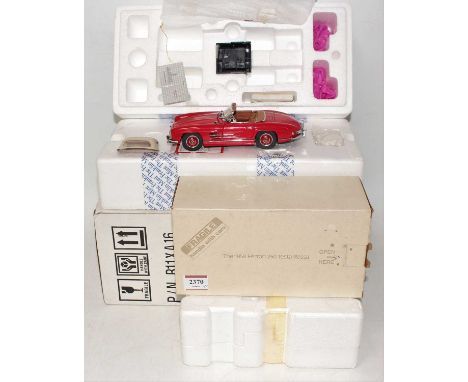 A Franklin Mint 1/24 scale boxed diecast group, two examples both housed in original polystyrene and card packaging to includ