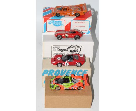 Four various boxed 1/43 scale white metal and resin kit built and factory hand built race car group to include a JP Kits of F