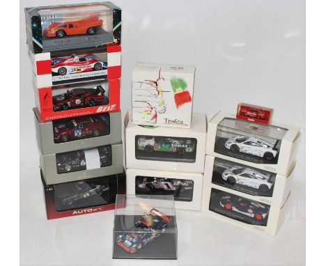 One box containing a quantity of various mainly 1/43 scale diecast race cars and vehicles to include an Ixo Models Maserati T