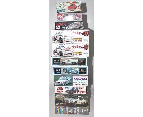 11 various boxed Airfix, Fujimi, Revell and other mainly 1/24 scale plastic vehicle kits, ten examples appear as issued, one 