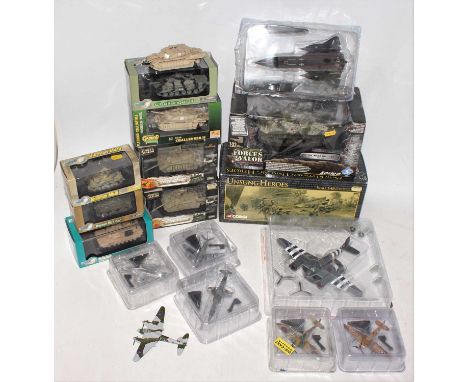 Two boxes containing a large quantity of various mixed military related diecasts to include Forces of Valor, Corgi Unsung Her
