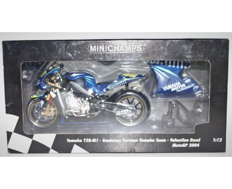 A Minichamps model No. 122043046 1/12 scale model of a Yamaha YZR-M1 Valentino Rossi Motor GP 2004 racing bike, housed in the