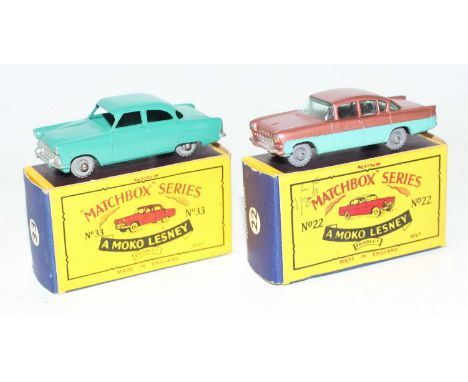 Matchbox group of 2 boxed models as follows: No.22 Vauxhall Cresta in metallic dark pink body with turquoise side panels fitt