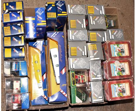 Two boxes containing a quantity of various mixed issue Corgi and Corgi Tramlines public transport diecast vehicles to include
