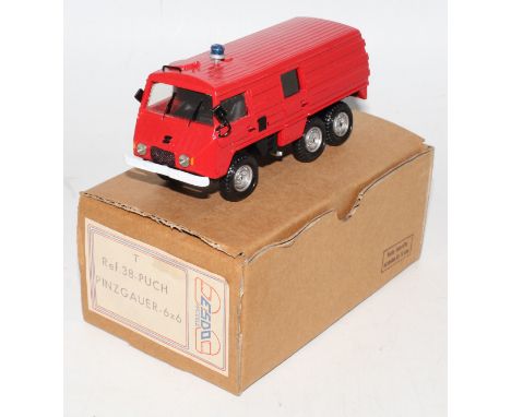 An Esdo Models Ref. No. 38 1/43 scale resin cast kit for a Pinz Gauer 6x6 fire appliance vehicle finished in red with blue ro