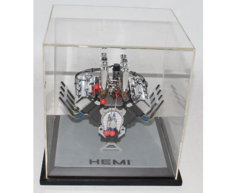 A GMP 1/6 scale Real Art Replicas of a Hemi Fire Power engine, housed in the original plastic/perspex display case, appears c