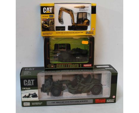 A collection of military and construction boxed diecast and radio controlled vehicles to include a Norscot 1/50 scale caterpi