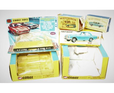 A small group of 6 empty boxes to include the following, Corgi 335 Jaguar E Type box in good condition, 74 Ford 5000 tractor 