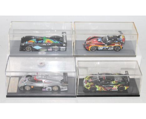 Four various plastic cased 1/43 scale resin diecast and factory hand built racing models to include a Gama Models Audi 24 hou