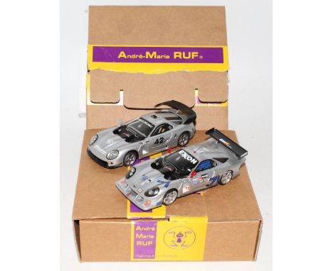 An Andre-Marie Ruf of France 1/43 scale white metal and resin kit built car group to include a Calloway C7R Essais 1996 Le Ma