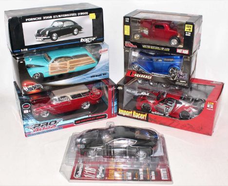 A group of 1:24 and 1:18 scale mixed of diecast models boxed, to include a Ricko Porsche 356B and a Jada Toys Nissan Z, 7 ite